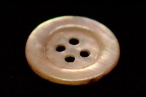 The Pearl Button: A bloodstained mother-of-pearl button